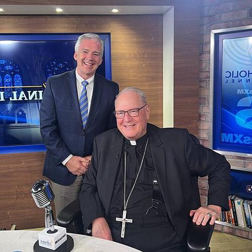 Cardinal Dolan 和 President Carey.